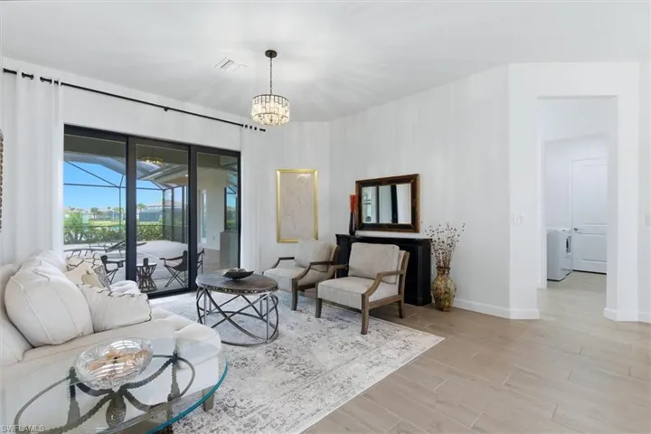 Living Room has glass sliders to lanai