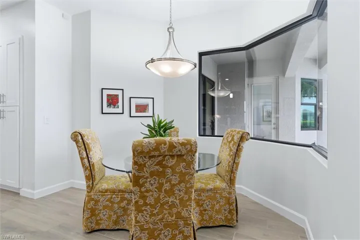 Breakfast Nook inside aquarium glass window
