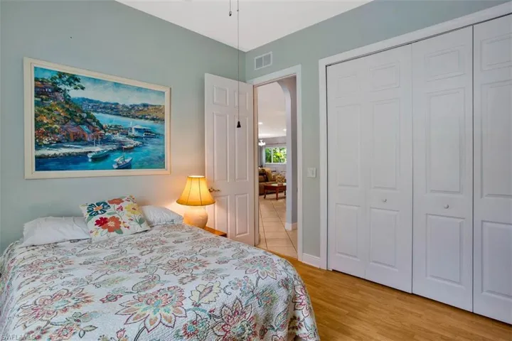 Bedroom featuring light hardwood / wood-style flooring and a closet