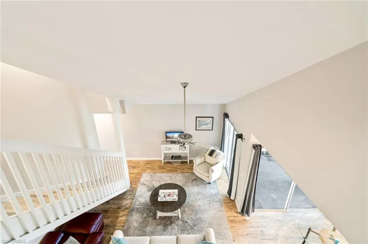 Living area with wood finished floors