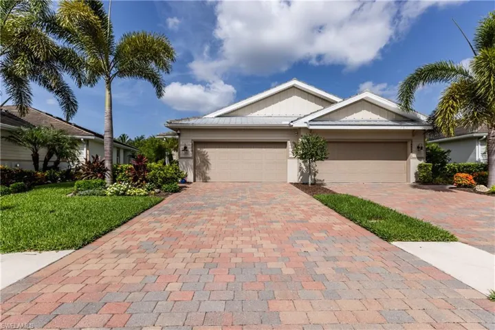 Plenty of room for parking on the paver driveway and 2 car garage