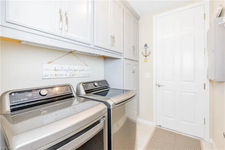 Extra updated cabinetry added to the laundry room