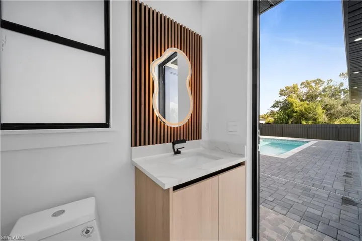 Bathroom with vanity and toilet