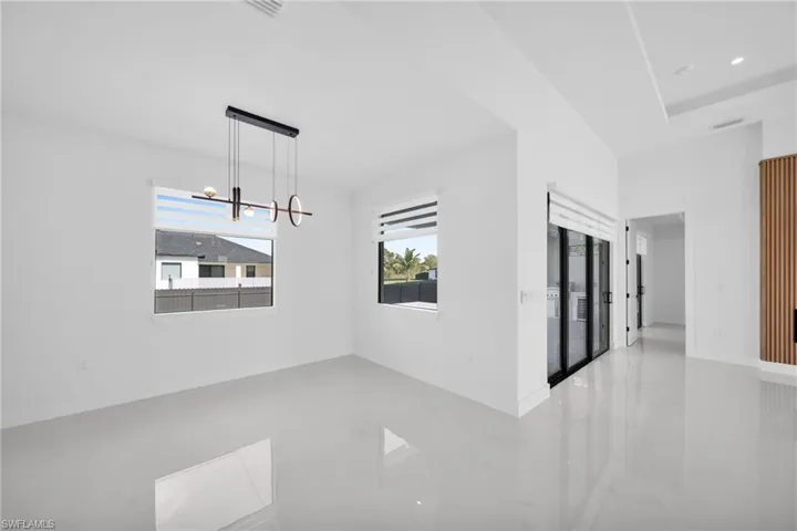 Unfurnished room with baseboards