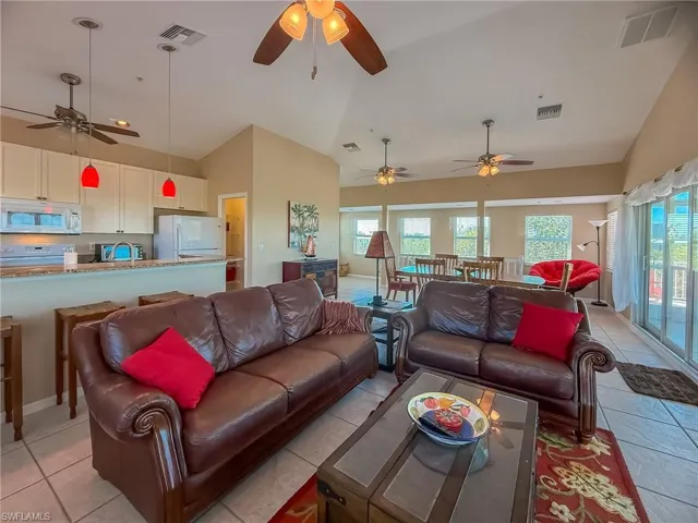 Living room featuring plenty of natural light and visible vents