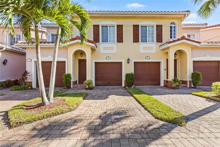 Mediterranean / spanish-style home featuring a garage