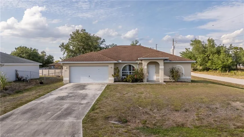 2700  58th W ST, Lehigh Acres, FL 33971