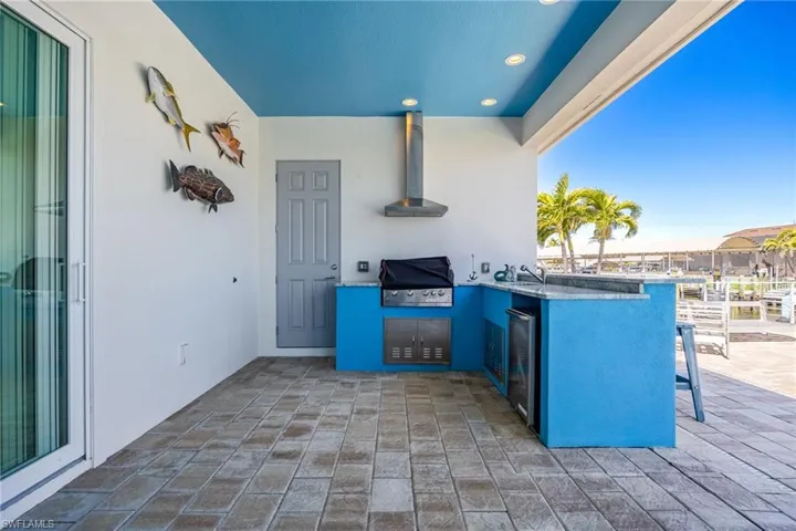 View of patio / terrace featuring an outdoor kitchen