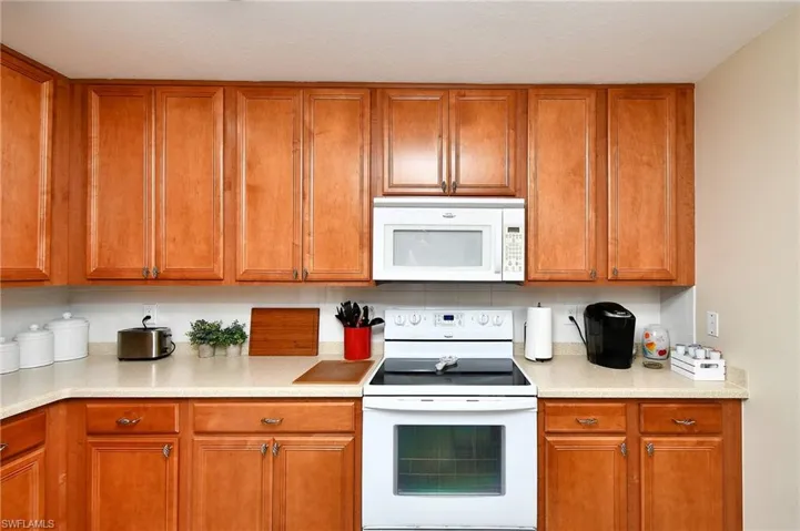 Plenty of cabinet space in this clean kitchen