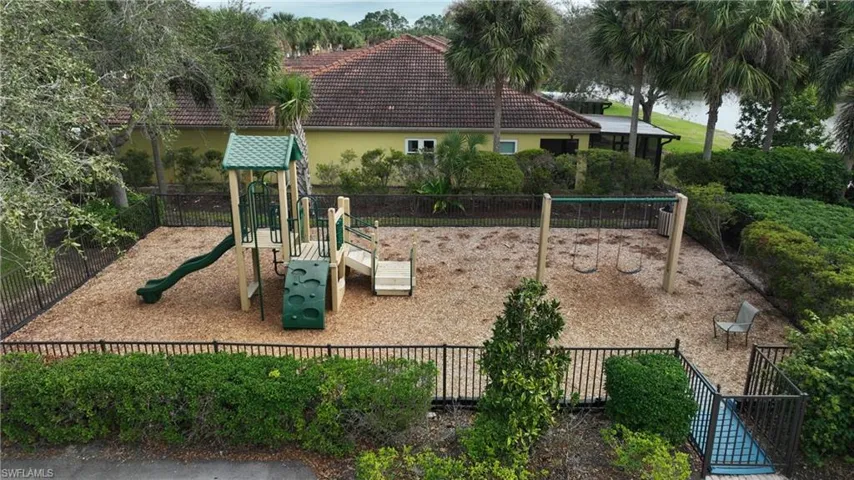 Playground beside pool for community use
