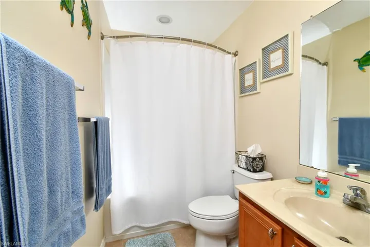 Guets bathroom across from guest bedroom