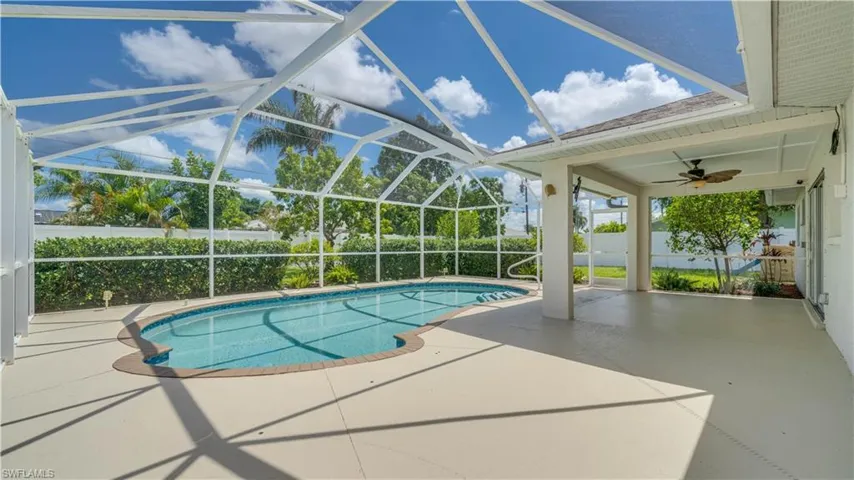 Resurfaced pool and tile 2026, lush landscaping