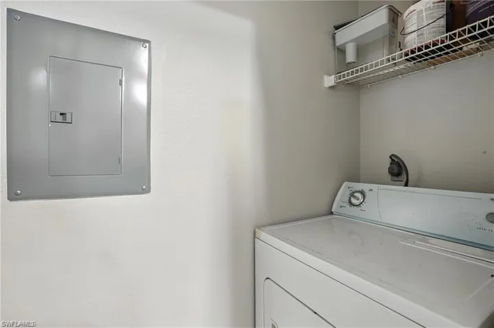 Laundry area with washer / dryer and electric panel