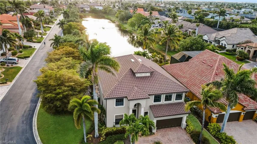 Aerial view featuring a residential view and a water view