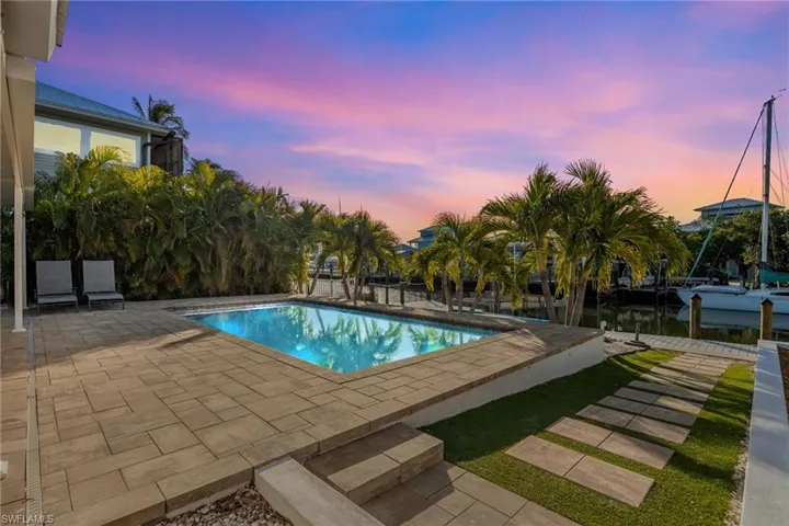 Outdoor pool featuring a patio area