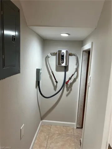 Closet with electric panel, and water heater