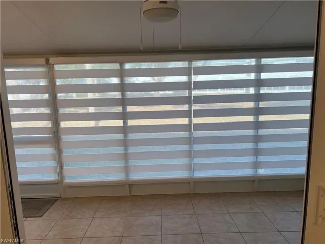 Lanai with window treatments