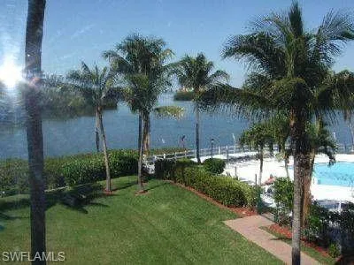 View of large pool by the highrise