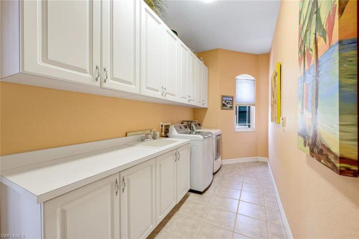Laundry with Cabinet Storage