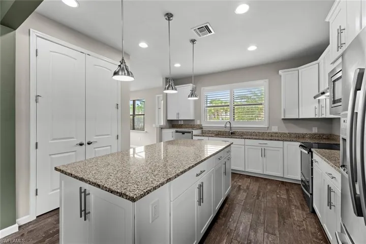 Large kitchen island w/plenty of storage - wall pantry