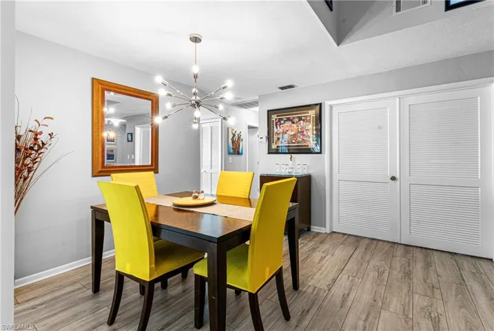 Dining space with a chandelier