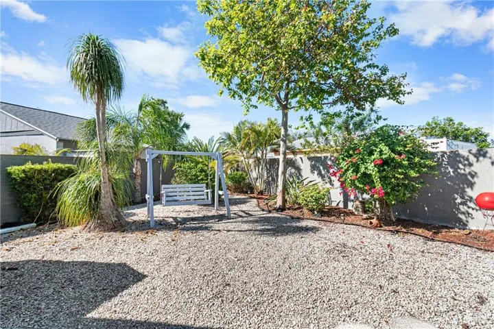 View of fenced backyard
