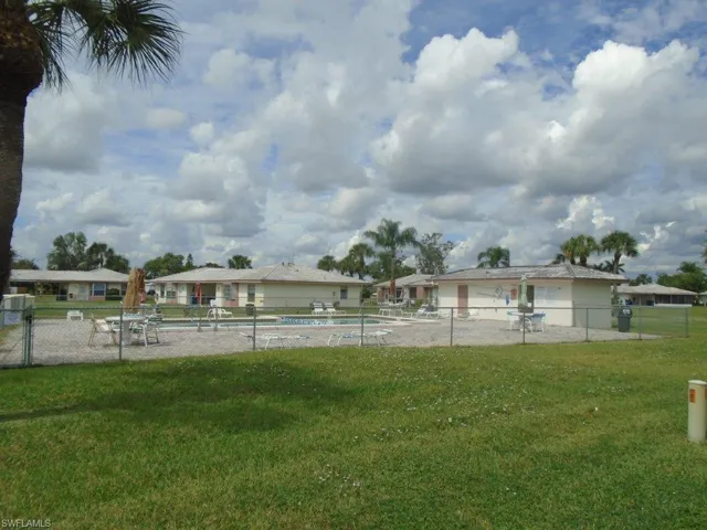 View of yard featuring a community pool
