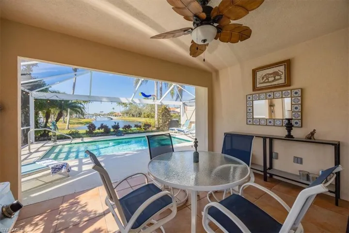 Dining area with tile patterned flooring and a textured ceiling
