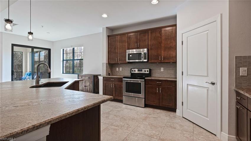 Granite countertops have a leather finish.