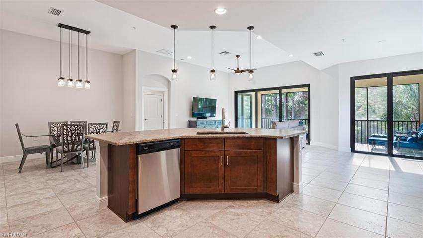 One level kitchen island with pendant lighting