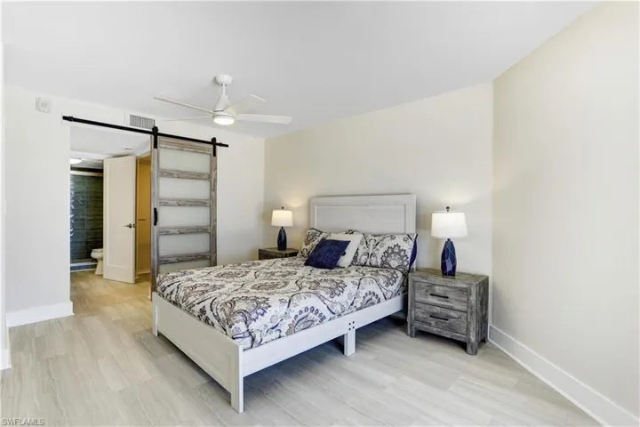 Barn door on main bathroom retreat.
