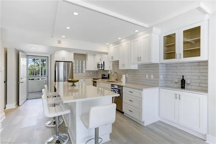 Subway tile backsplash, recessed listing, coffee/wine bar