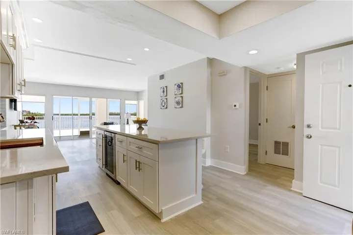 Quartz counters, soft close cabinetry, large breakfast island