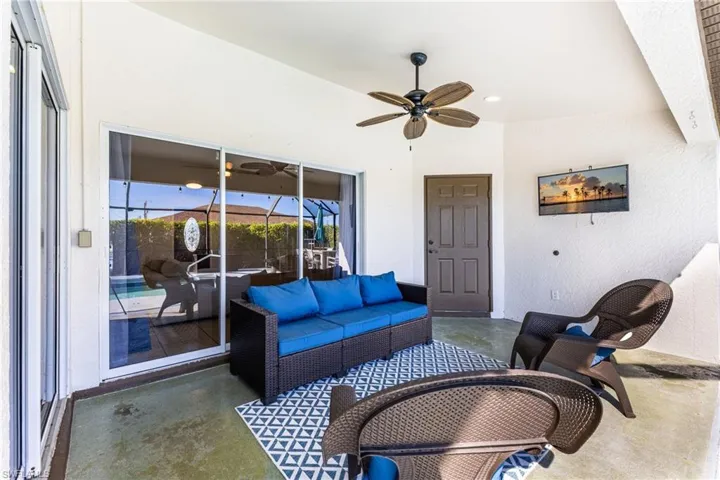 View of patio / terrace with ceiling fan and an outdoor hangout area