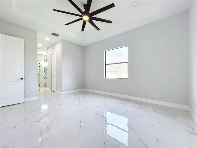 Unfurnished room with ceiling fan
