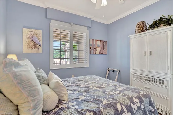 Bedroom featuring ornamental molding