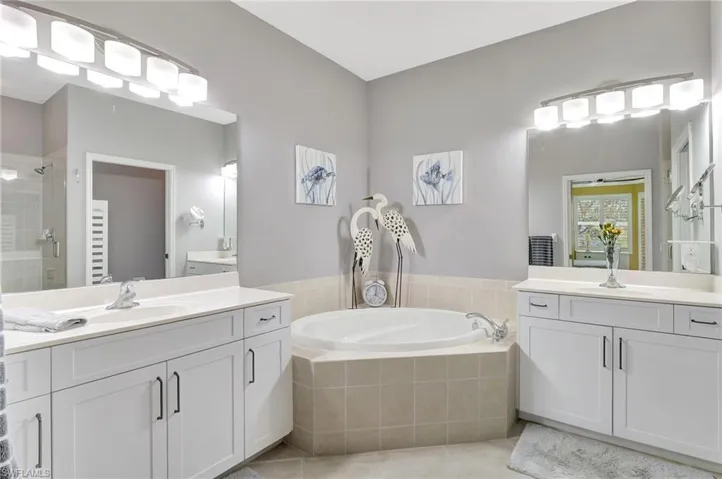Dual sinks with tub and shower