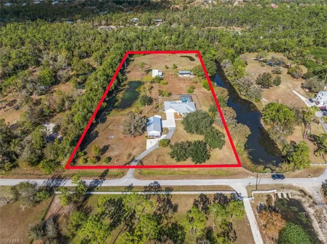 View of property location featuring property boundaries highlighted and a large body of water