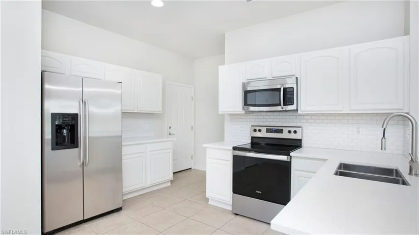 Updated kitchen with stainless appliances