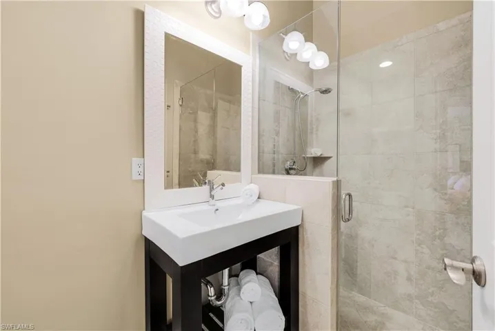 Bathroom featuring walk in shower