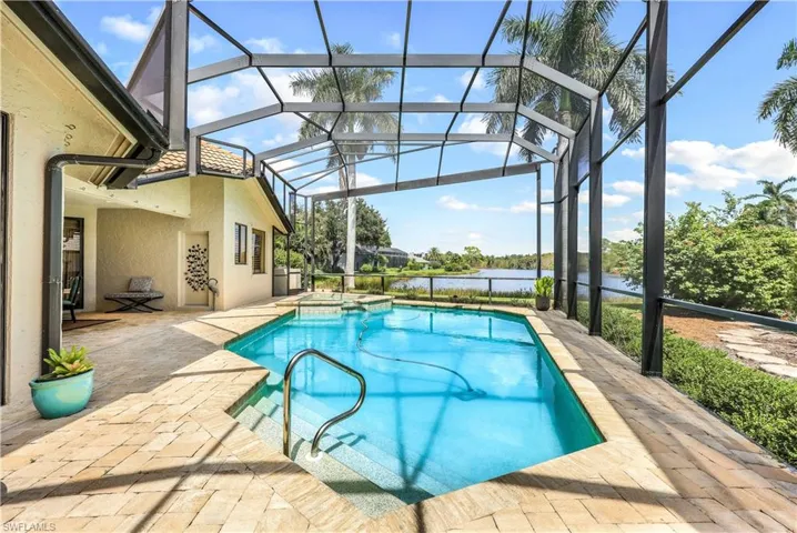 View of pool featuring a lanai and a patio area