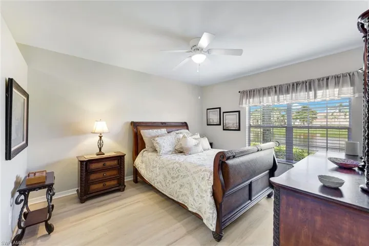 Bedroom featuring light wood-style floors and a ceiling fan