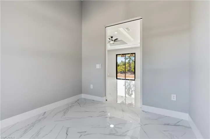 Looking out of den towards living room