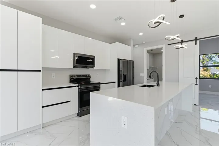 Kitchen looking toward utility room