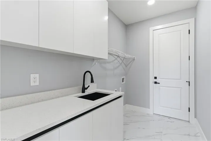 Laundry room with cabinetry