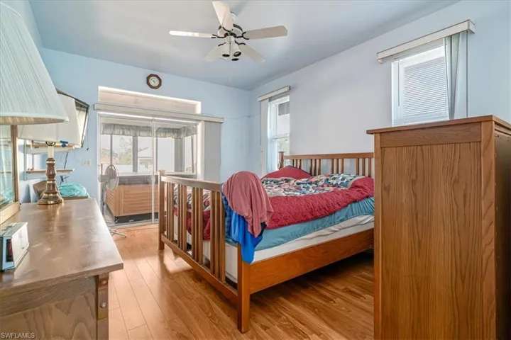 Bedroom featuring light wood-type flooring and ceiling fan