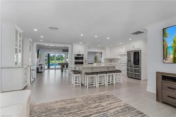 Living room with visible vents and recessed lighting