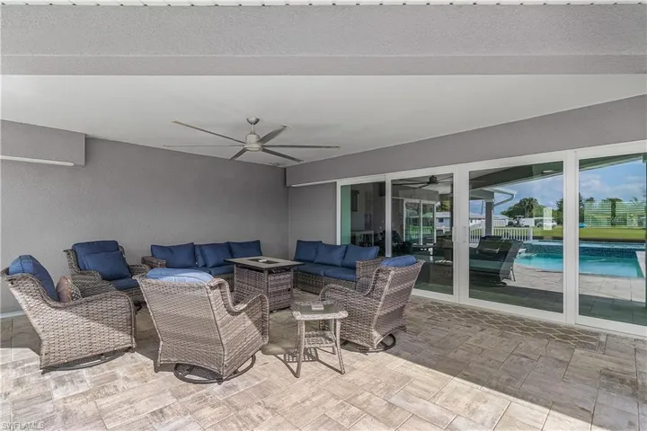 View of patio / terrace with an outdoor hangout area and ceiling fan