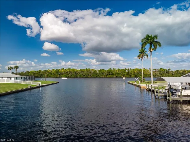 Water view featuring a dock