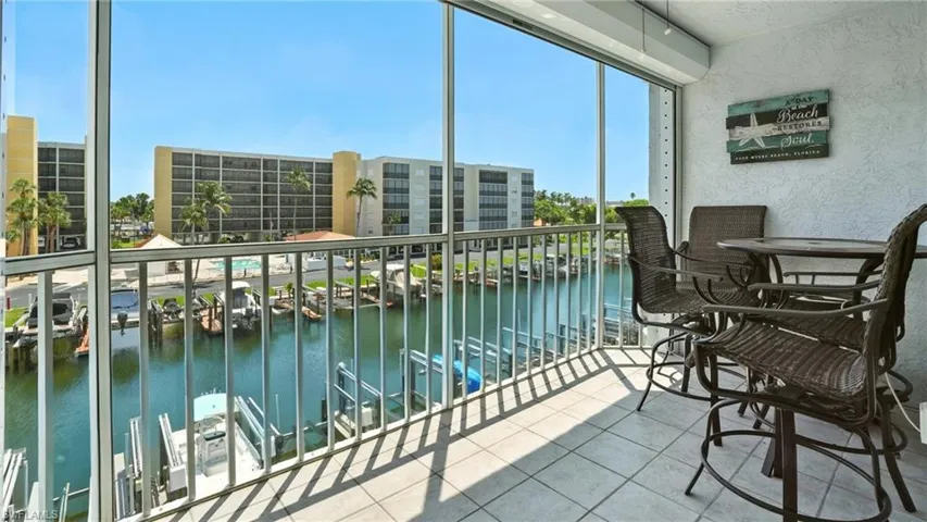 Balcony featuring a water view - Virtually Edited Image